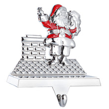 Load image into Gallery viewer, Stocking Holder - Christmas Santa Stocking Hanger for Mantel - Shiny Silver Metal Santa On Chimney Christmas Stocking Holder for Fireplace Mantle - Heavy Stocking Holder for Mantle with Hook By Klikel