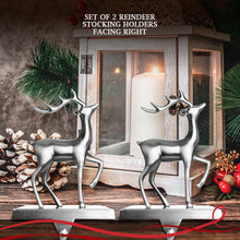 Load image into Gallery viewer, Stocking Holder Set of 2 - Christmas Reindeer Stocking Hanger for Mantel - Shiny Silver Metal Deer Christmas Stocking Holder for Fireplace Mantle - Heavy Stocking Holder for Mantle-Facing Right